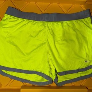 Nike women’s Neon Yellow Dri-FIT Athletic Shorts